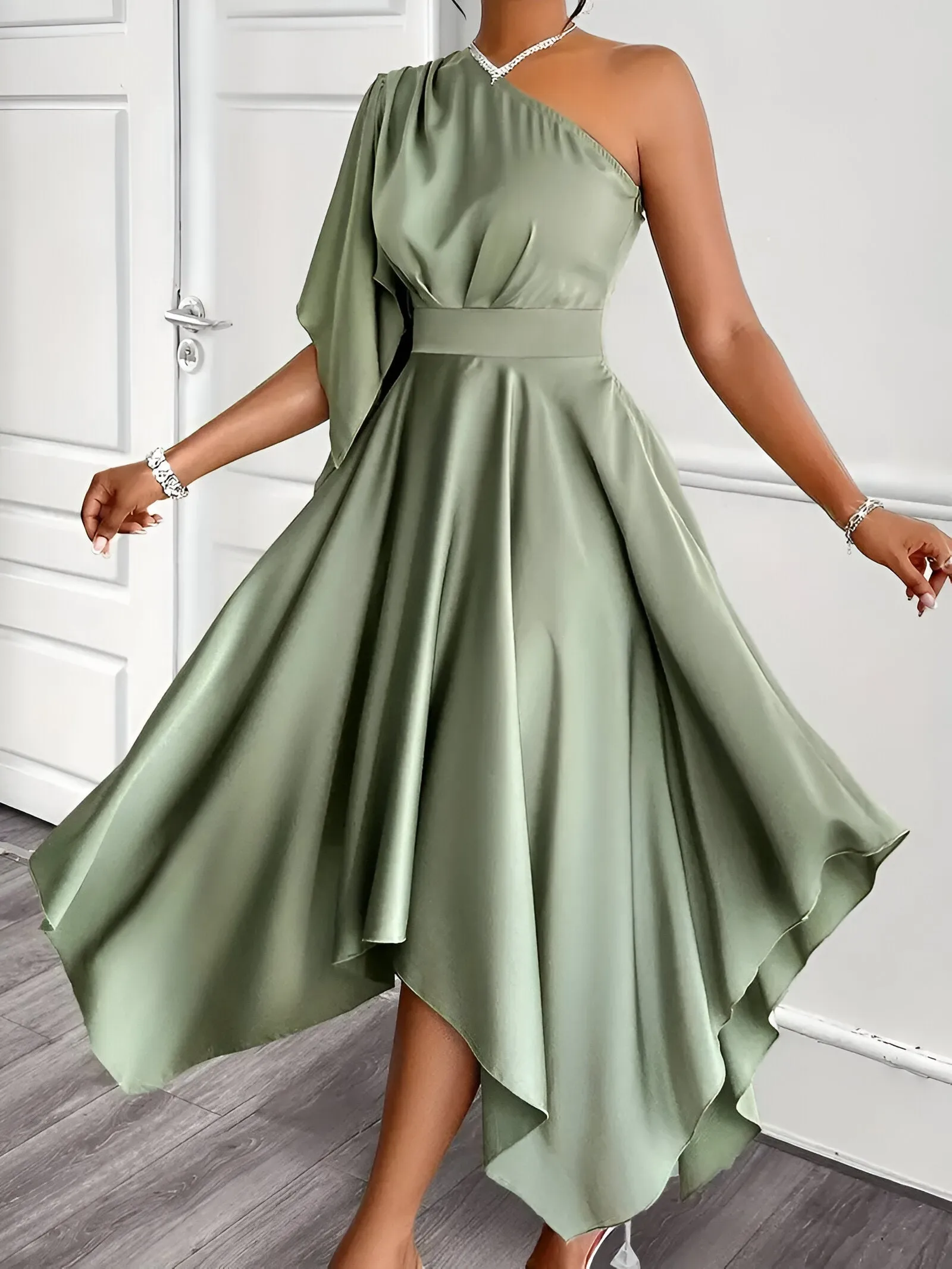 Caia | Elegant asymmetrical peplum dress with one shoulder