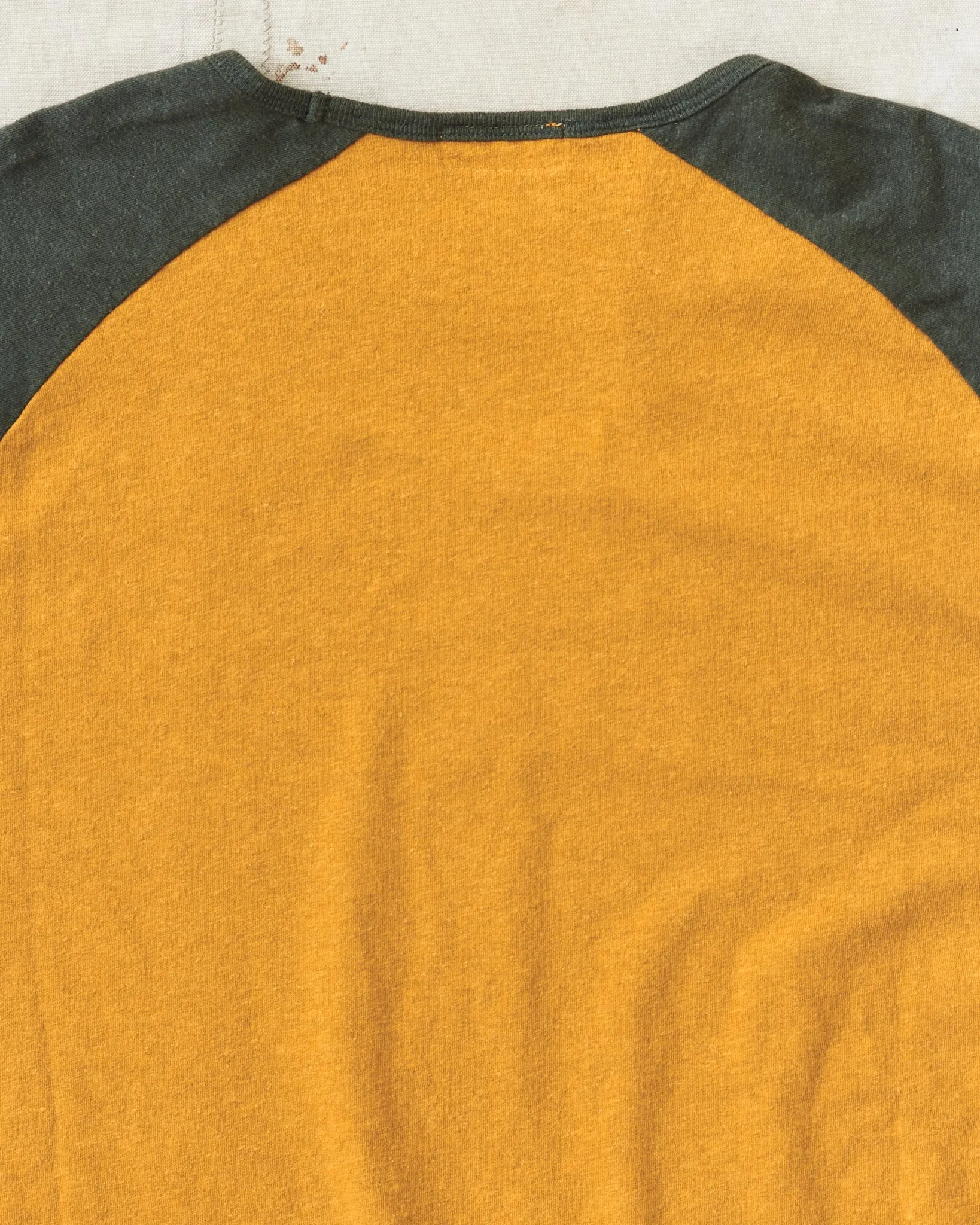 Indigofera Leon Raglan Sweater Orange / Green Resin